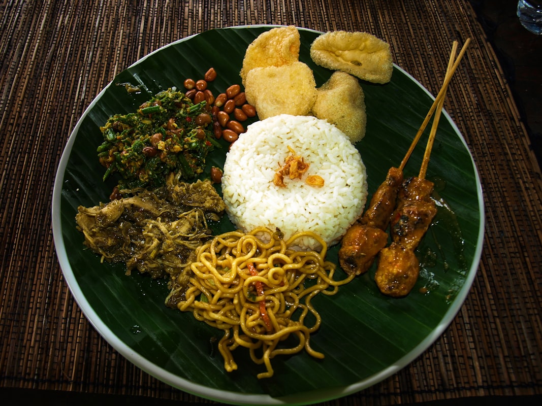 Traditional jamu herbal drink preparation with turmeric and ginger