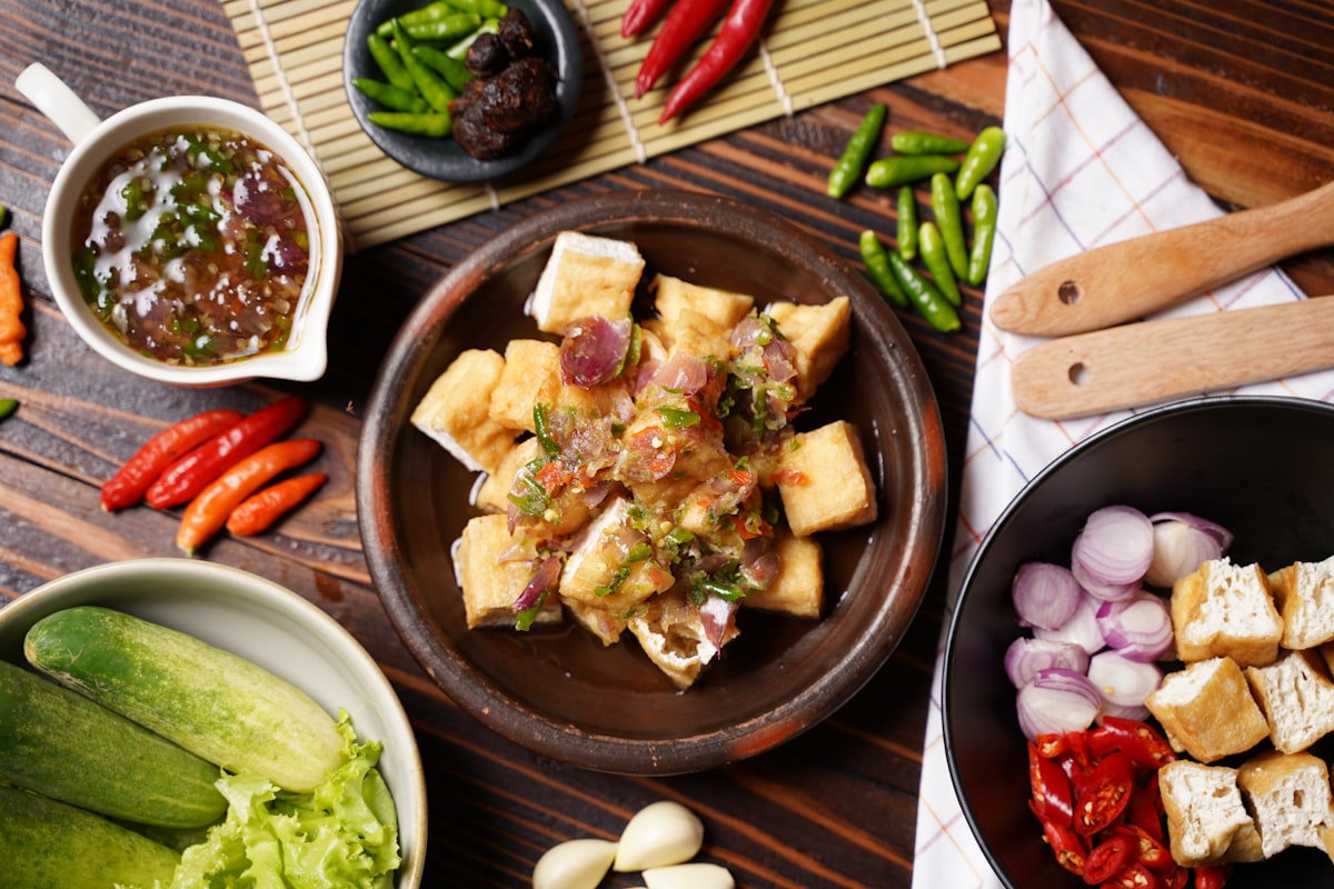 Traditional Indonesian evening meal with tempeh, vegetables and spices